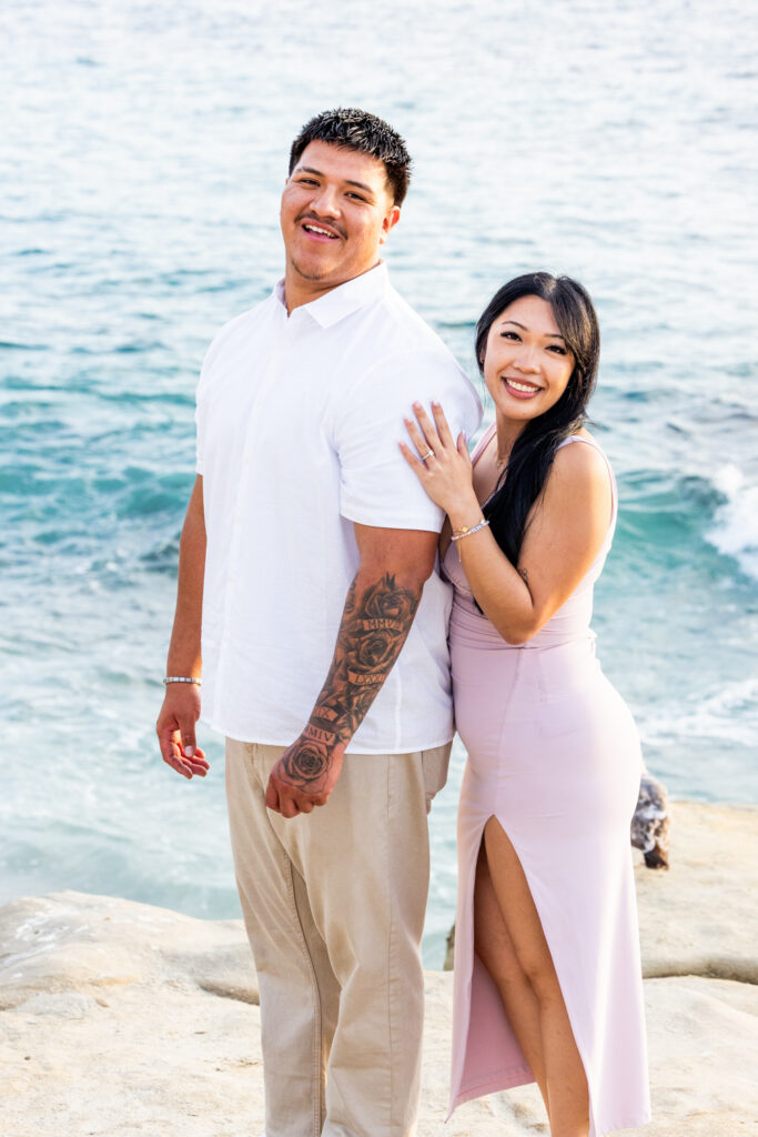 A Low-Key La Jolla Proposal with 50 Red Roses and Family Waiting Nearby san diego beach photographer 6